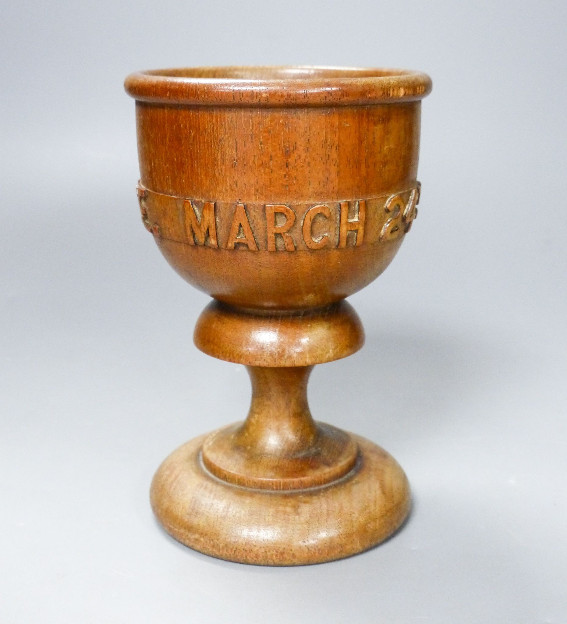 A turned and carved wood goblet made from the timber of the ship Eurydice and dated March 24th 1878, 15cm 15cm